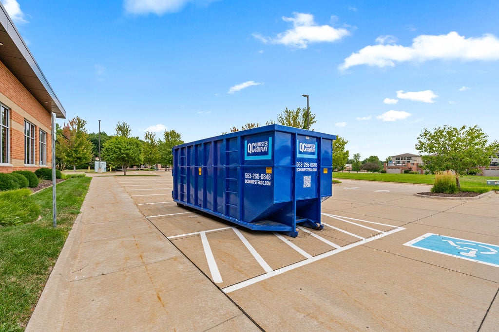 QC Dumpster Company roll-off dumpster